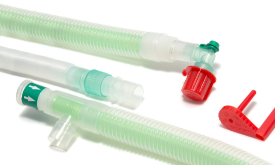 Using an anaesthetic breathing system leak tester